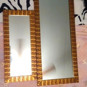Two mirrors with decorative frame. Gold/ bronze metallic painted. $10 pair.